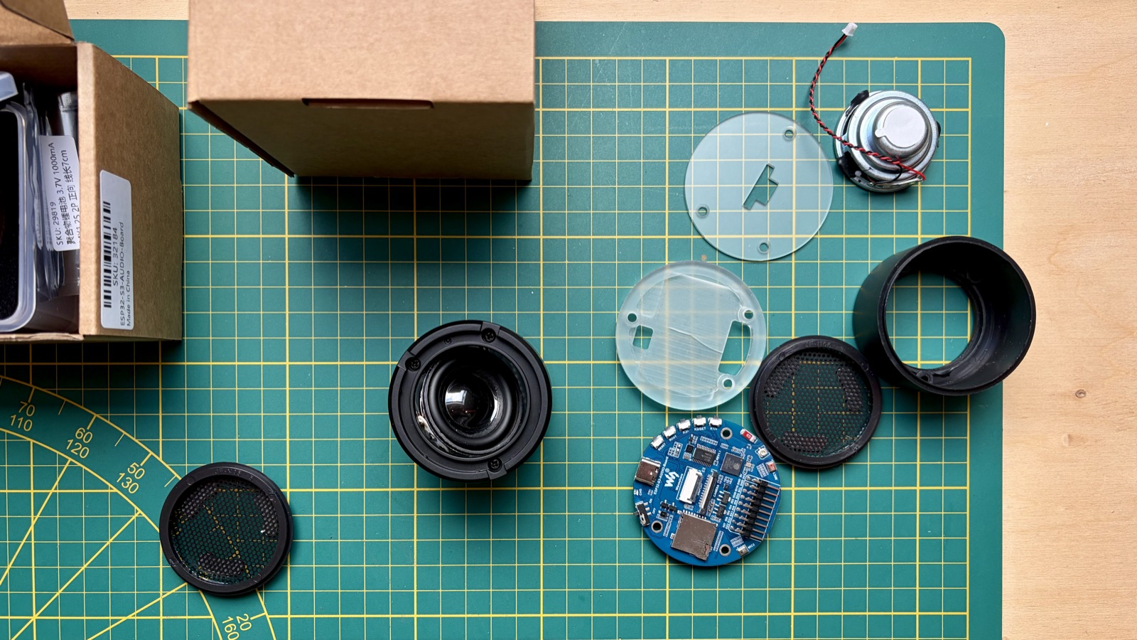 V3 parts: AudioBoard, speakers, enclosure parts, 1000 mAh battery.